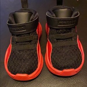 Jordan’s size 4 red/black